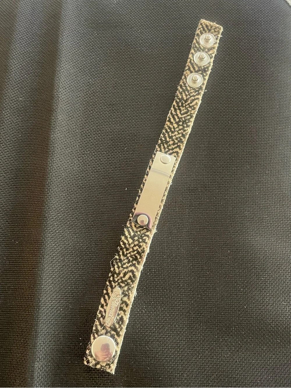 Plunder Brown Zebra Print Leather Snap Bracelet. Silver rectangular ID tag. NEW